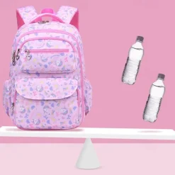 Girls' Cute Printed School Backpack with Heart Zipper Charm, Lightweight Waterproof Multi-Pocket Bookbag for Elementary and Middle School Students, Available in Pink, Purple, Blue, and Beige
