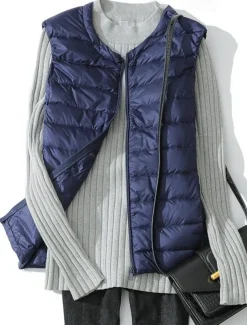 Light down vest women's short round neck autumn and winter new shoulder down jacket guts plus size