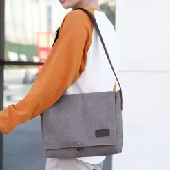 Men's Brown Canvas Messenger Bag with Adjustable Shoulder Strap and Minimalist Design - Durable and Stylish for Work or Casual Use