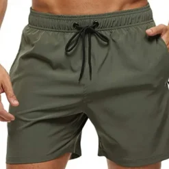 Men's Swim Trunks Swim Shorts Board Shorts Bathing Suit Drawstring with Pockets Swimming Surfing Beach Water Sports Solid Colored Summer Spring