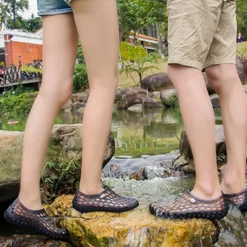 Men's Women's Black and Blue Barefoot Perforated Slip-On Water Shoes with Rubber Sole for Comfortable Beach and Water Activities