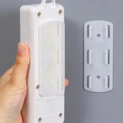 6pcs Wall-Mounted Holder Punch-Free Plug Fixer Self-Adhesive Socket Fixer Seamless Power Strip Holder Home Cable Wire Organizer Racks