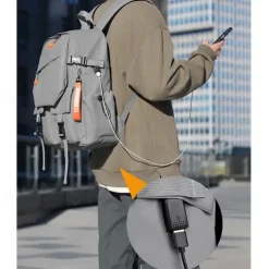 Unisex Gray Utility Backpack – Water-Resistant School and Travel Bag with Buckle Straps and Multiple Storage Pockets