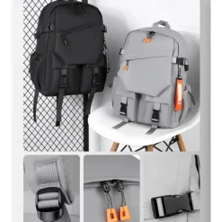 Unisex Gray Utility Backpack – Water-Resistant School and Travel Bag with Buckle Straps and Multiple Storage Pockets