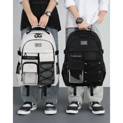 Unisex Waterproof School Backpack with Multi-Pocket Design and Laptop Compartment, Casual Large Capacity Travel Daypack for Students and Commuters