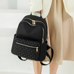 Women's Black Quilted Nylon Backpack with Gold Zippers and Studded Front Pocket – Stylish Lightweight Bag for School, Work, or Daily Use