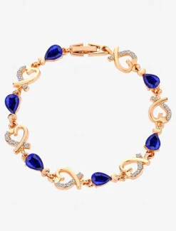 Women's Gold Bracelet with Red Teardrop Crystals and Heart-Shaped Accents, Elegant Romantic Design for Valentine's Day Gift, Weddings, and Special Occasions