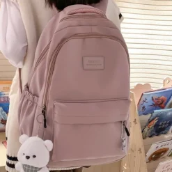 Women's Light Green School Backpack with Cute Plush Bear Keychain, Large Capacity Multi-Pocket Waterproof Bookbag for Teen Girls, College, and Daily Use