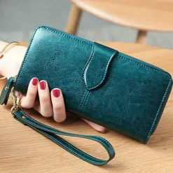 Women's RFID Blocking Faux Leather Wallet - Multi-Compartment Zipper Clutch with Card Slots, Phone Holder, and Wristlet Strap for Travel and Everyday Use