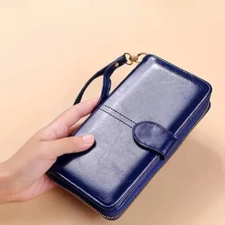 Women's RFID Blocking Faux Leather Wallet - Multi-Compartment Zipper Clutch with Card Slots, Phone Holder, and Wristlet Strap for Travel and Everyday Use
